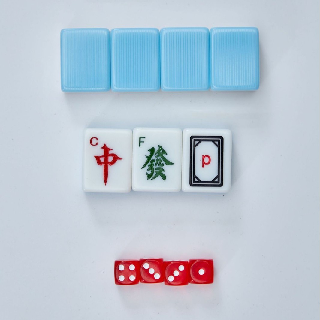 Numbered Chinese mahjong tiles, light blue back