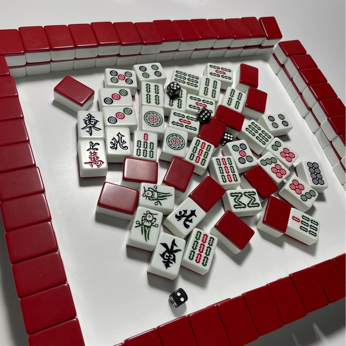 40 mm blank mahjong tiles before a branded red color run